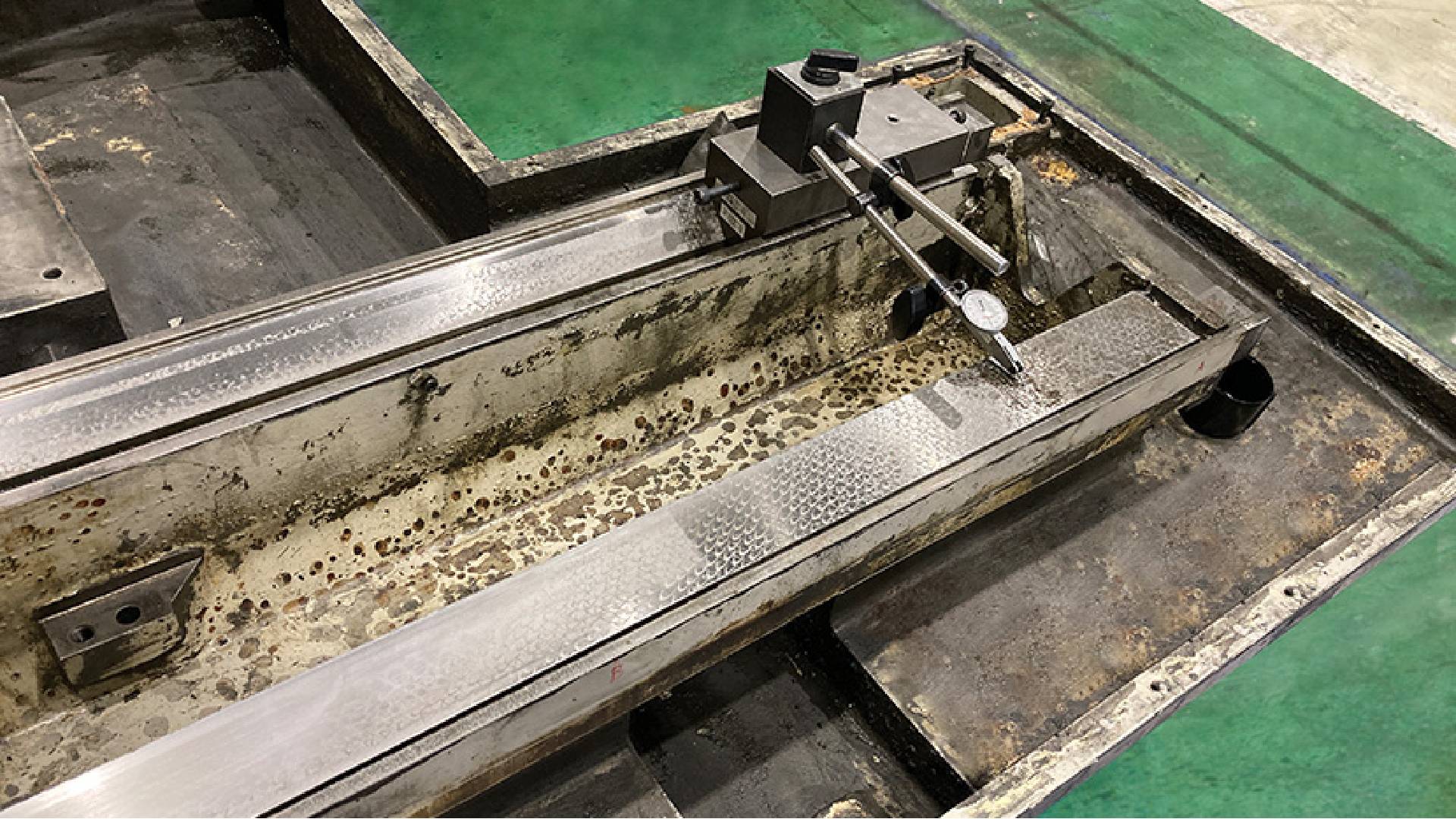 Industrial machine calibration setup in workshop