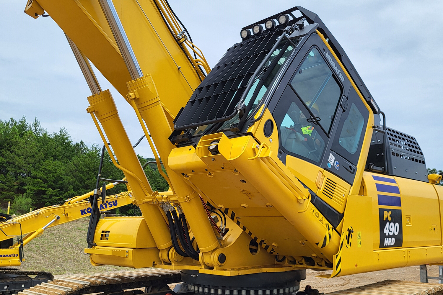 Tilting demolition cab