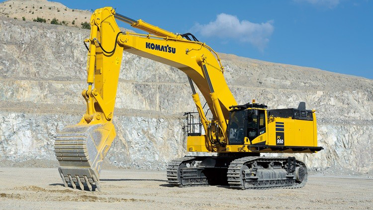 Komatsu PC2000 excavator digging on a job site.