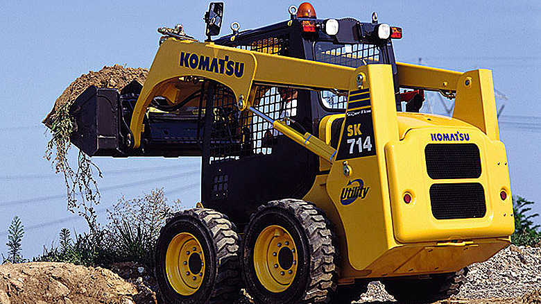 Komatsu PC2000 excavator digging on a job site.